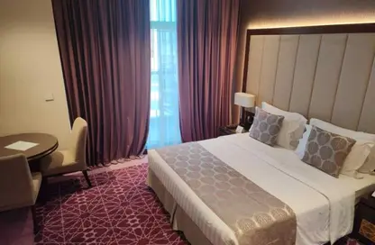 شقة - غرفة نوم - 1 حمام للايجار في رويال كونتيننتال سويتس - الخليج التجاري - دبي