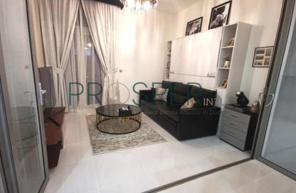 Apartment - 1 Bedroom - 2 Bathrooms for sale in Miraclz Tower by Danube - Arjan - Dubai