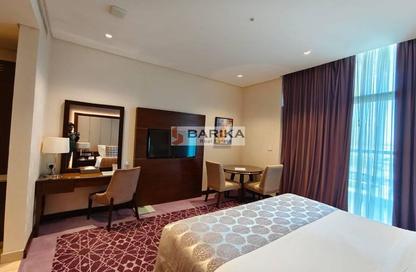 Apartment - Studio - 1 Bathroom for rent in Royal Continental Suites - Business Bay - Dubai