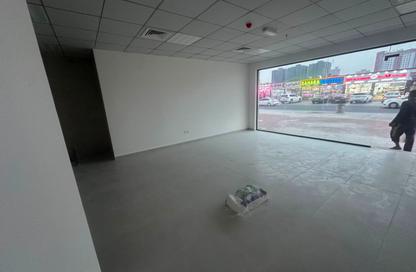 Shop - Studio for rent in Al Rashidiya Towers - Al Rashidiya - Ajman Downtown - Ajman
