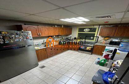 Apartment - 3 Bedrooms - 3 Bathrooms for sale in Al Ghanem Business Center - Al Majaz 3 - Al Majaz - Sharjah