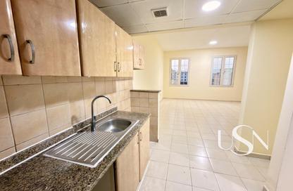 Apartment - Studio - 1 for rent in Building X23 - England Cluster - International City - Dubai