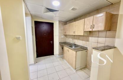 Apartment - Studio - 1 for rent in Building X23 - England Cluster - International City - Dubai