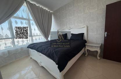 Apartment - 2 Bedrooms - 2 Bathrooms for sale in Orient Tower 1 - Orient Towers - Al Bustan - Ajman