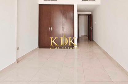 Apartment - 1 Bedroom - 2 Bathrooms for rent in City Apartments - District 11 - Jumeirah Village Circle - Dubai