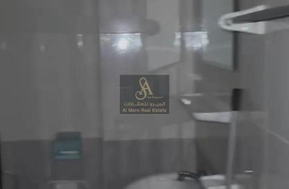 Apartment - 1 - 2 for sale in Lilies Tower - Emirates City - Ajman