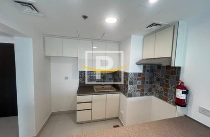 Apartment - 1 Bedroom - 2 Bathrooms for rent in Rabdan Building - Motor City - Dubai