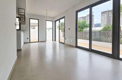Villa - 4 - 5 for rent in Aura Gardens - Tilal Al Ghaf - Dubai