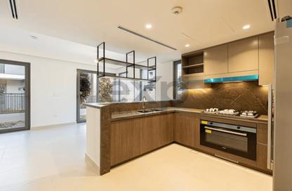 Townhouse - 4 - 5 for sale in Aura Gardens - Tilal Al Ghaf - Dubai