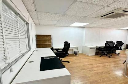 Business Centre - Studio - 2 Bathrooms for rent in Al Kazim Building - Karama Park Area - Al Karama - Dubai