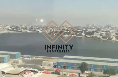 شقة - غرفة نوم - 2 حمامات للبيع في أورينت تاور 1 - أورينت تاور - البستان - عجمان