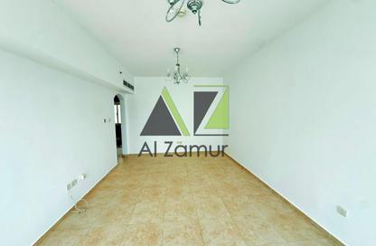 Apartment - 1 Bedroom - 2 Bathrooms for rent in Ahmed Al Murr Building - Dubai Silicon Oasis - Dubai