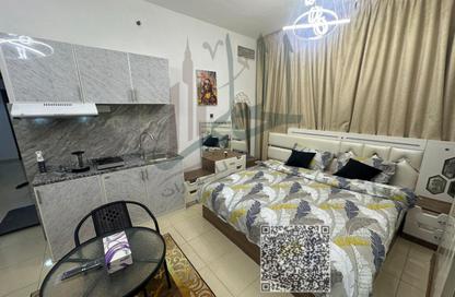 Apartment - 2 Bedrooms - 3 Bathrooms for sale in Orient Tower 1 - Orient Towers - Al Bustan - Ajman