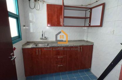 Apartment - Studio - 1 Bathroom for rent in Thani Yarmook Building - Halwan - Sharjah