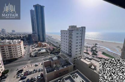 Apartment - 1 Bedroom - 2 Bathrooms for rent in Corniche Tower - Ajman Corniche Road - Ajman