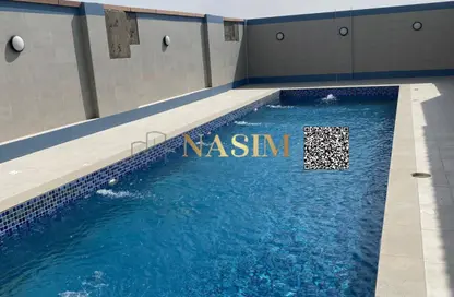 Apartment - 2 Bedrooms - 2 Bathrooms for sale in Al Ghoroub Tower - Al Alia - Ajman