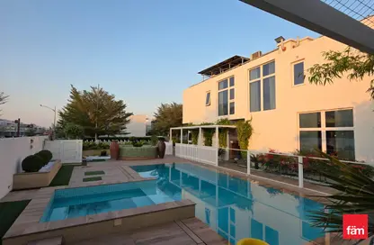 Villa - 4 Bedrooms - 4 Bathrooms for sale in Reportage Village 1 - Reportage Village - Dubai Land - Dubai