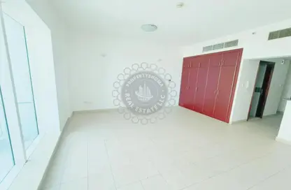 Apartment - 1 Bedroom - 2 Bathrooms for rent in Cricket Tower - Dubai Sports City - Dubai