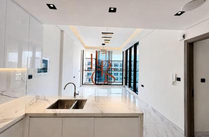 Apartment - 1 - 2 for sale in Samana Santorini - Dubai Studio City - Dubai