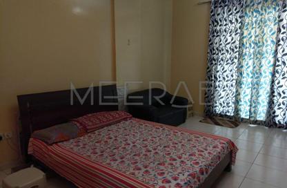 Apartment - Studio - 1 Bathroom for rent in Building IC1-EMR-05 - Emirates Cluster - International City - Dubai