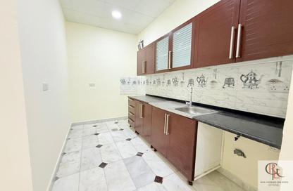 Apartment - 1 - 2 for rent in Mohamed Bin Zayed Centre - Mohamed Bin Zayed City - Abu Dhabi