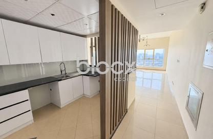 Apartment - 2 - 2 for rent in Dana Tower - District 12 - Jumeirah Village Circle - Dubai