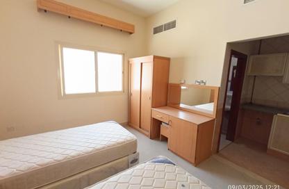Apartment - Studio - 1 Bathroom for rent in Al Butina 9 Building - Al Butina - Sharjah