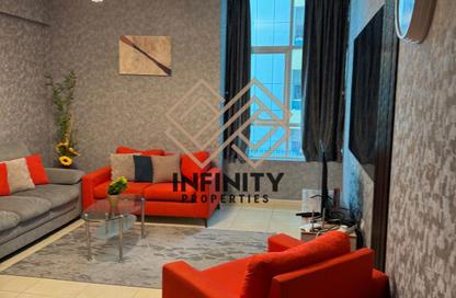 Apartment - 1 Bedroom - 2 Bathrooms for sale in Orient Tower 1 - Orient Towers - Al Bustan - Ajman