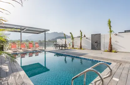 Villa - 4 Bedrooms - 5 Bathrooms for rent in Al Dana Villas - Sharm - Fujairah