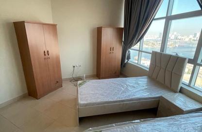 Apartment - 2 Bedrooms - 1 Bathroom for sale in Orient Tower 1 - Orient Towers - Al Bustan - Ajman