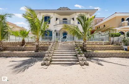 Villa - 5 Bedrooms - 6 Bathrooms for rent in Garden Homes Frond E - Garden Homes - Palm Jumeirah - Dubai