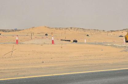 أرض - استوديو للبيع في السحمة - ضاحية الرويضات - الشارقة