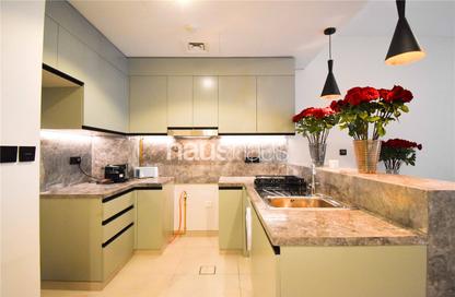 Apartment - 1 - 1 for sale in Golf Gate - Damac Hills - Dubai