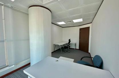 Business Centre - Studio - 2 Bathrooms for rent in Junaibi Tower - Al Danah - Abu Dhabi