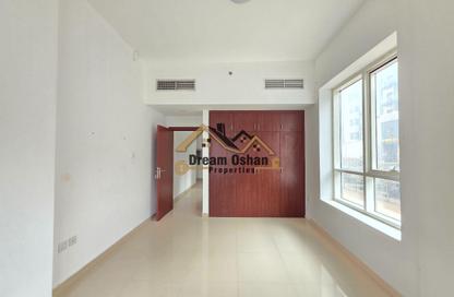 Apartment - 1 - 1 for rent in Al Jawaher Building - International City Phase 2 - Al Warsan 4 - Al Warsan - Dubai