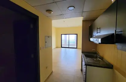 Apartment - Studio - 1 Bathroom for rent in Silicon Gates 1 - Silicon Gates - Dubai Silicon Oasis - Dubai