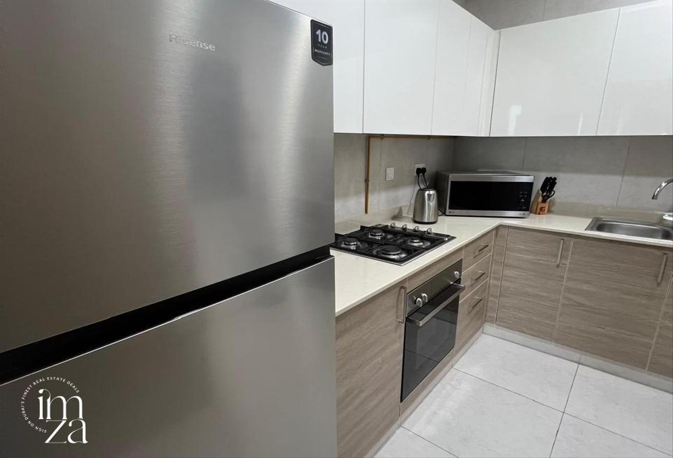Furnished 1BHK | Vacant Soon | Mid Floor photo 4