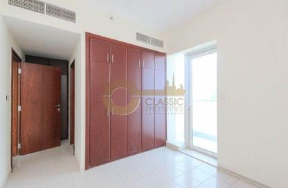 Apartment - 1 Bedroom - 2 Bathrooms for sale in Cricket Tower - Dubai Sports City - Dubai