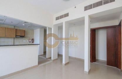 Apartment - 1 Bedroom - 2 Bathrooms for sale in Cricket Tower - Dubai Sports City - Dubai