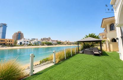 Villa - 4 - 5 for rent in Garden Homes Frond B - Garden Homes - Palm Jumeirah - Dubai