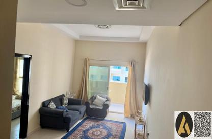 Apartment - 1 Bedroom - 2 Bathrooms for sale in Lilies Tower - Emirates City - Ajman