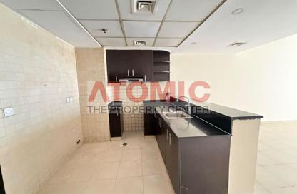 Apartment - 1 - 2 for rent in Rawabi Residence - International City Phase 2 - Al Warsan 4 - Al Warsan - Dubai
