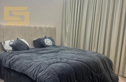 Apartment - 1 - 1 for sale in Lilies Tower - Emirates City - Ajman