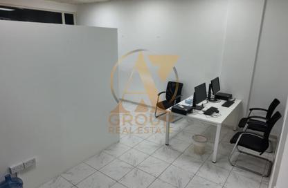 Shop - Studio for rent in Building Z04 - England Cluster - International City - Dubai