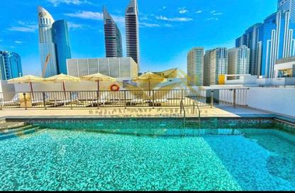 Apartment - 1 Bedroom - 2 Bathrooms for rent in Jumeirah Garden City - Al Satwa - Dubai