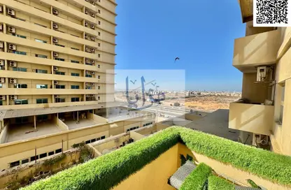 Apartment - 1 Bedroom - 2 Bathrooms for sale in Lilies Tower - Emirates City - Ajman