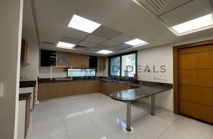 Townhouse - 4 - 5 for rent in Gardenia Townhomes - Wasl Gate - Dubai