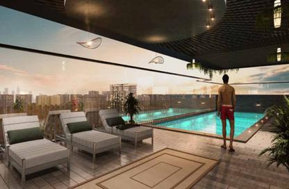 Apartment - 1 Bedroom - 2 Bathrooms for sale in AUM 99 Residences - Dubai Land Residence Complex - Dubai