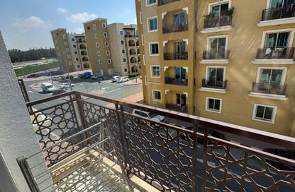 شقة - 1 حمام للايجار في مبنى آيج1-هـإمآر-14 - طراز إماراتي - المدينة العالمية - دبي