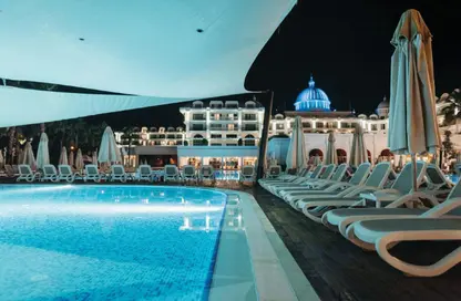 شقة - غرفة نوم - 2 حمامات للبيع في VHS برج الكريستال من - المدينة العالمية - دبي